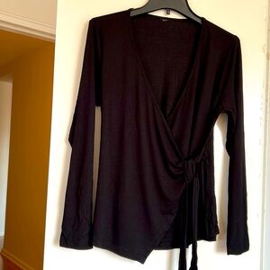 Women’s wrap top.  Long sleeves.  Rayon. Size L.